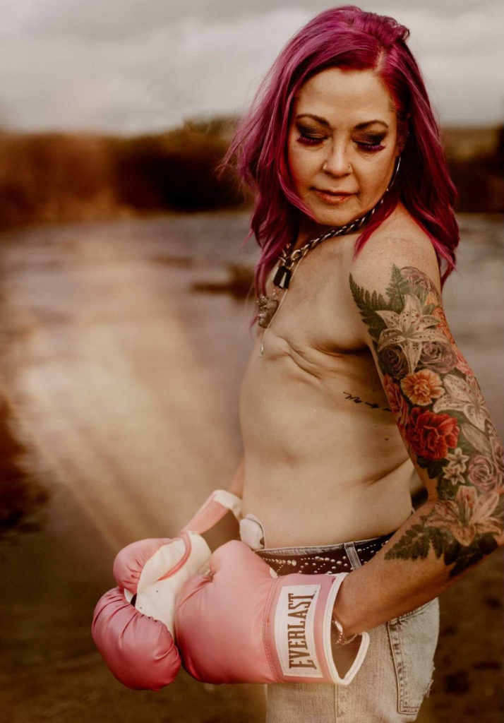 Woman with double Mastectomy pink boxing gloves